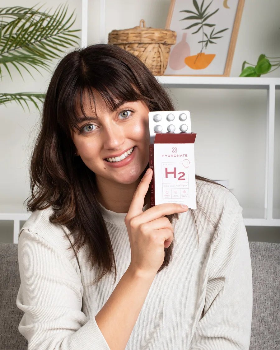 A Hydronate customer holding the box
