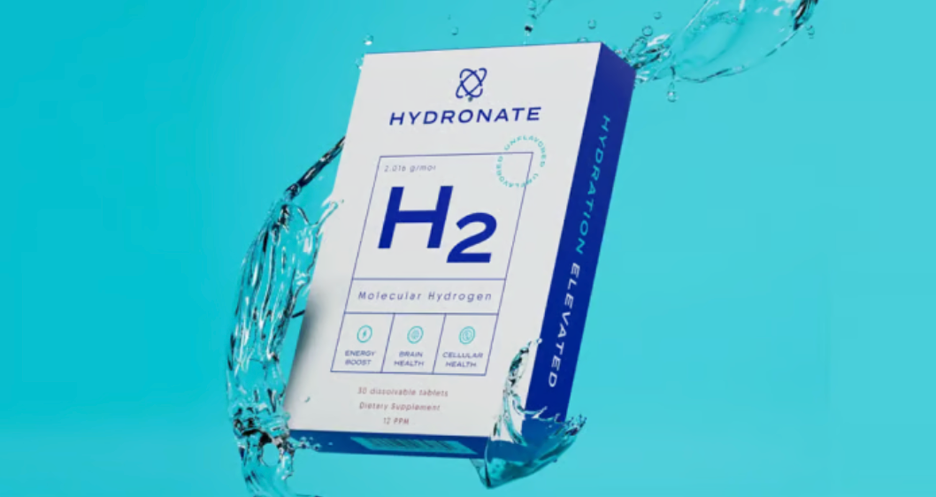 A Hydronate H2 Molecular Hydrogen box, white with blue accents, suspended against a cyan background with a dynamic water splash wrapping around it.