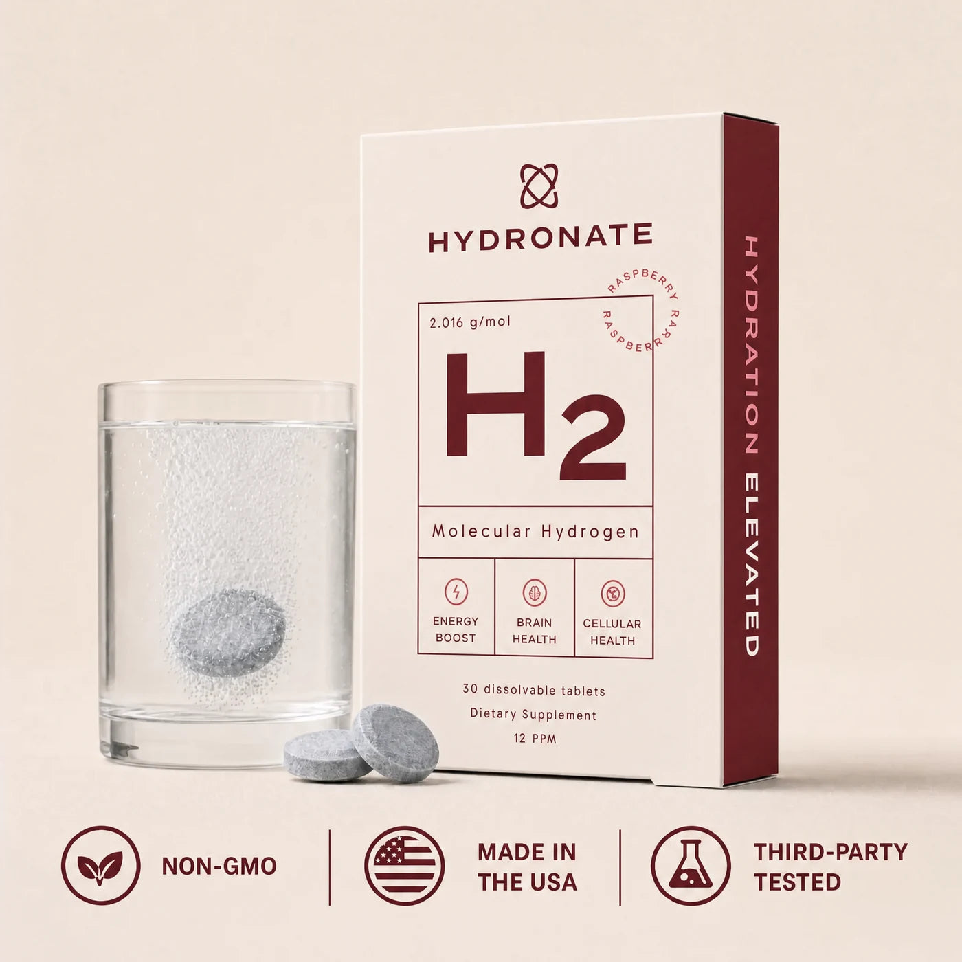 Hydronate Raspberry carton beside a glass of hydrogen water
