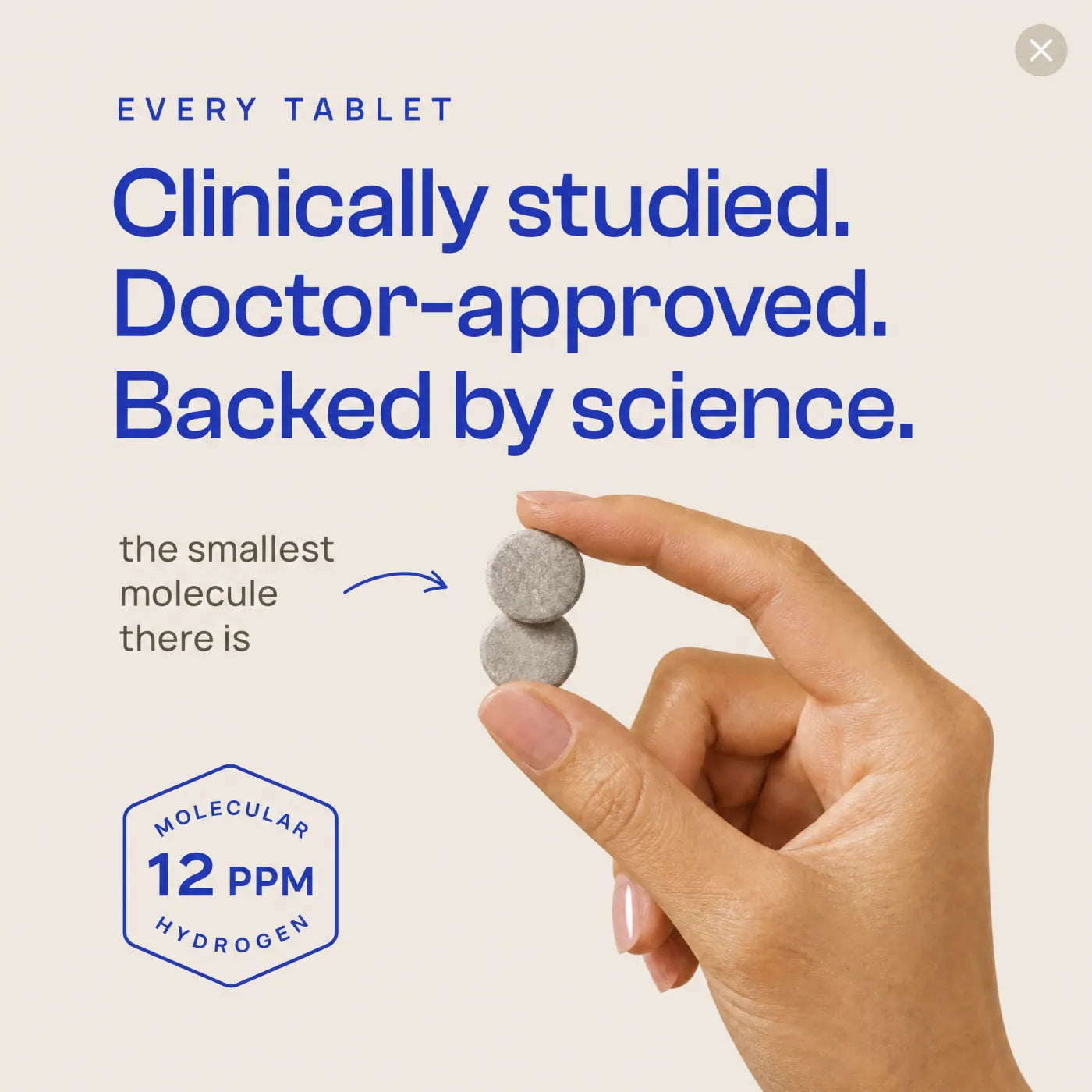 A single Hydronate tablet held between two fingers