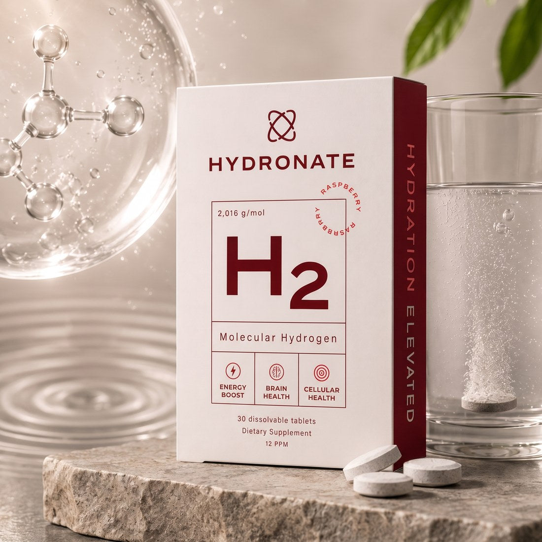 Hydronate H2 molecular hydrogen pack beside a glass of water with a tablet dissolving.